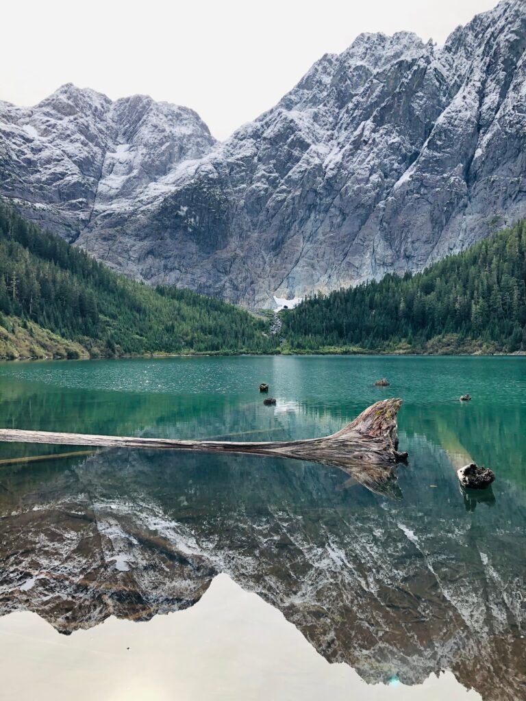 Beautiful Canadian mountain lake reflection snow